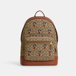 DISNEY X COACH WEST BACKPACK IN SIGNATURE JACQUARD WITH MICKEY MOUSE PRINT